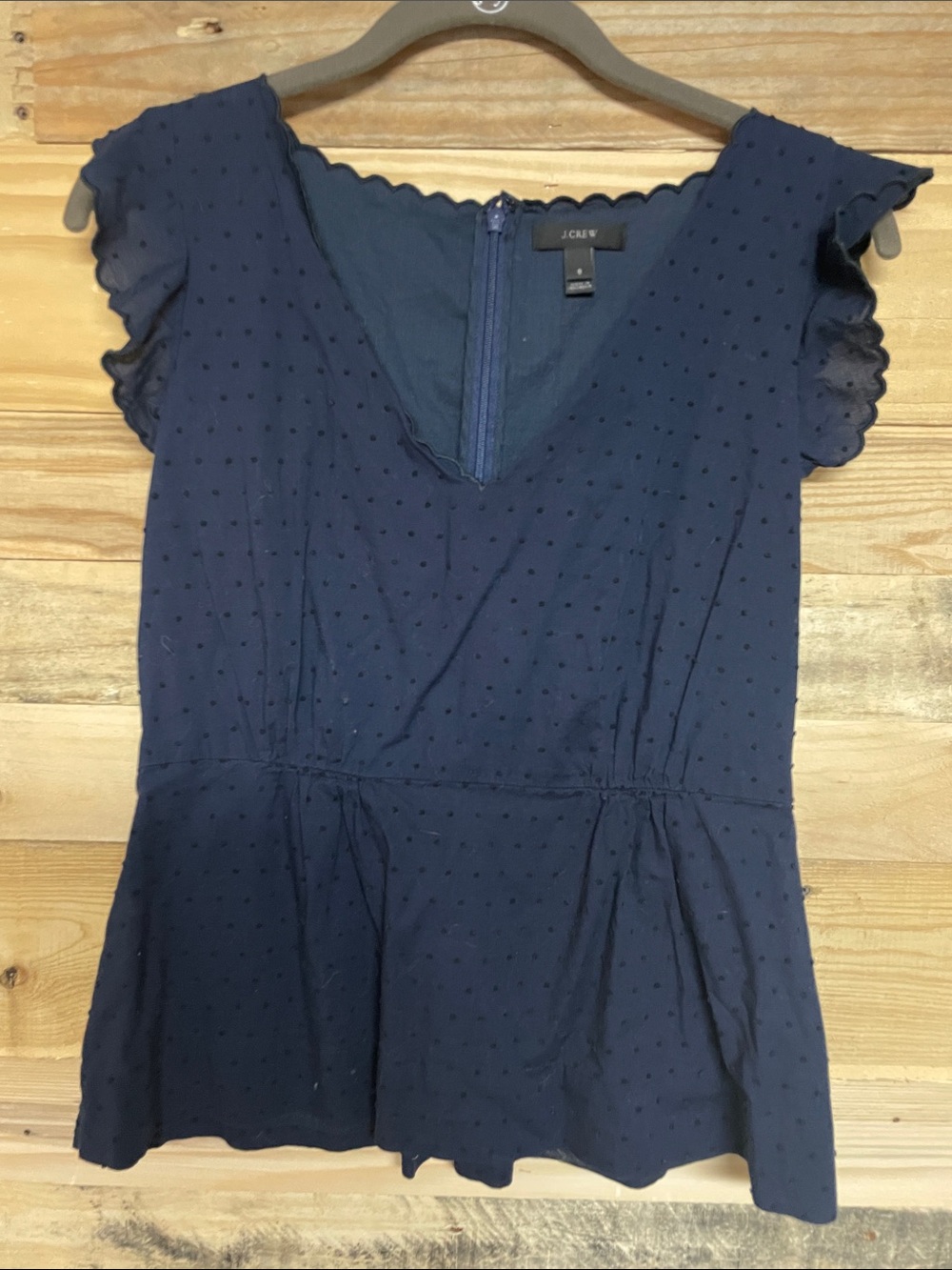 J Crew size 8 navy sleeveless Swedish dot v-neck peplum blouse with hook and zip